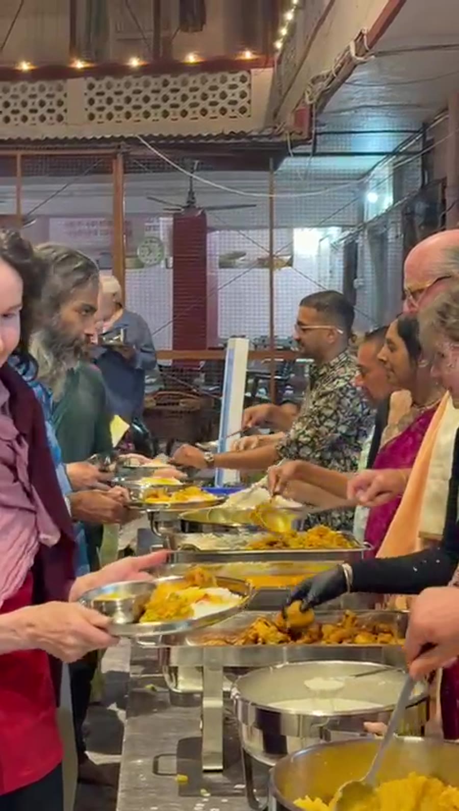 Community meal served at long tables